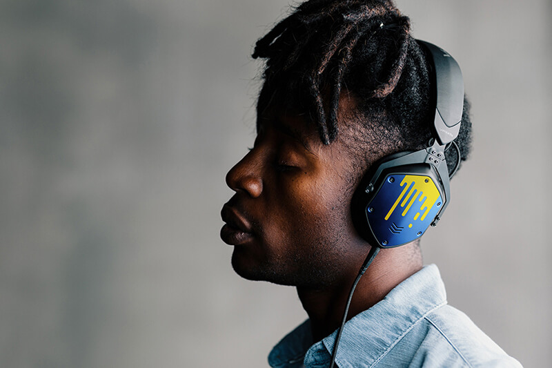 Man listens to custom printed headphones