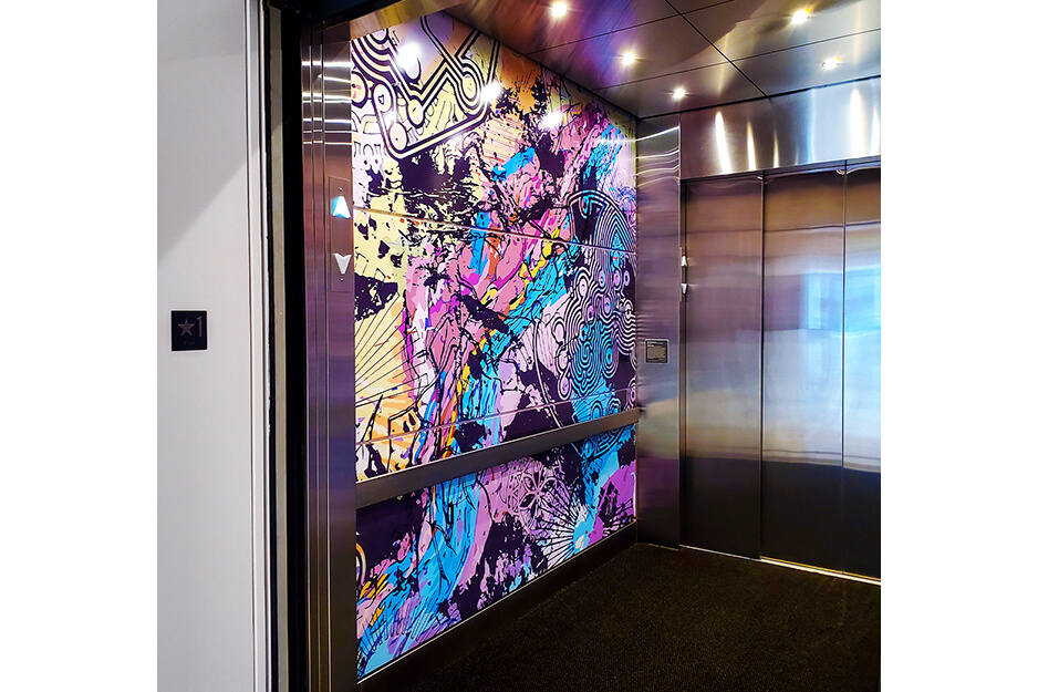 Asheville Color and Imaging produced these colorful elevator graphics on its Roland DG TrueVIS VG2-540 wide-format digital printer/cutter.