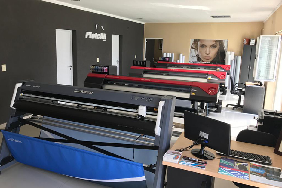 This view of Beta's production room shows its fleet of Roland DG wide-format printers and printer/cutters.