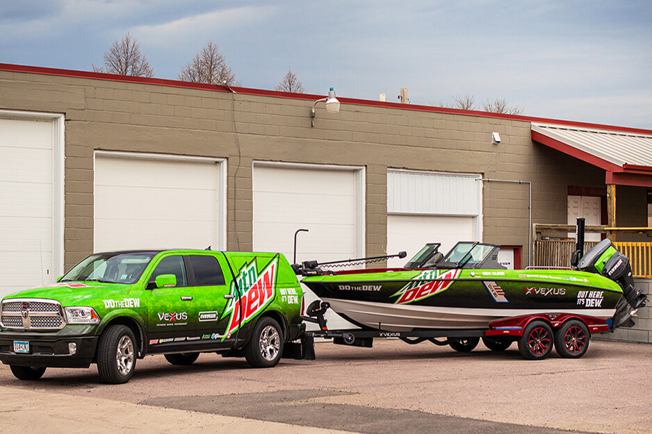 Mountain Dew graphics-wrapped truck and boat, printed by Fuel Graphics on a Roland DG TrueVIS VG2-540 digital printer/cutter.