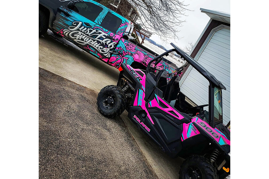 The colorful graphics on this pick up truck and UTV were produced by Just Fab Graphics on its Roland DG TrueVIS VG2-540 digital printer/cutter.
